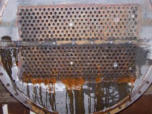 Heat exchanger pitting damage clearly visible after grit blasting