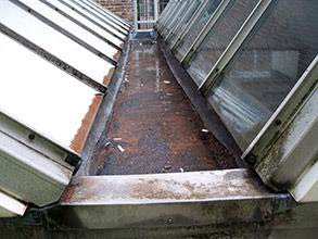 Heavily corroded valley gutter