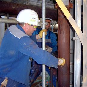 Surface preparation of a corroded pipework within a refinery